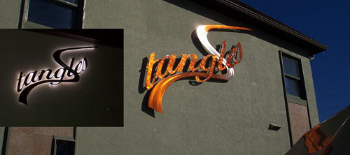 Tangles Hair Design and Day Spa Building signage - night & day