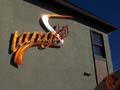 Tangles Hair Design and Day Spa Building signage - night & day