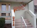Tangles Hair Design and Day Spa Signage at entrance